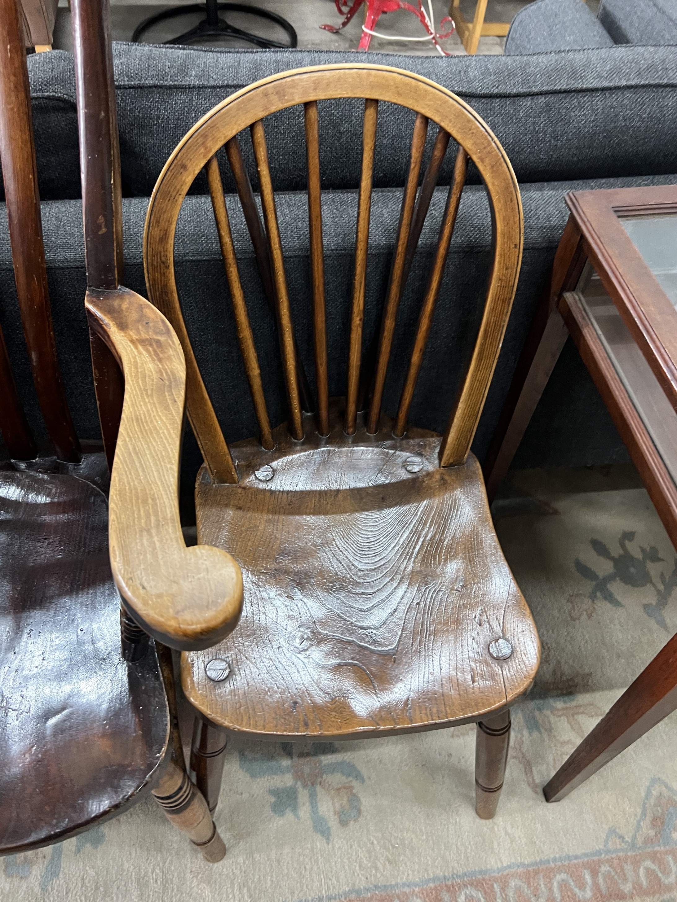 A Victorian elm and beech lathe back Windsor armchair, width 56cm, depth 47cm, height 114cm together with two Victorian Windsor comb back kitchen chairs